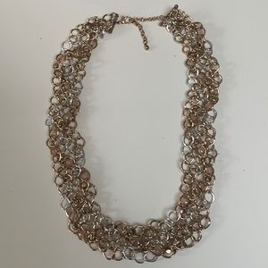 Beautiful necklace.Silver tone and gold tone with small stone.